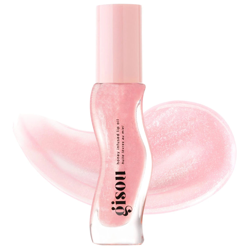 Aceite labial Gisou Honey Infused Lip Oil en tono rosa claro con muestra de brillo