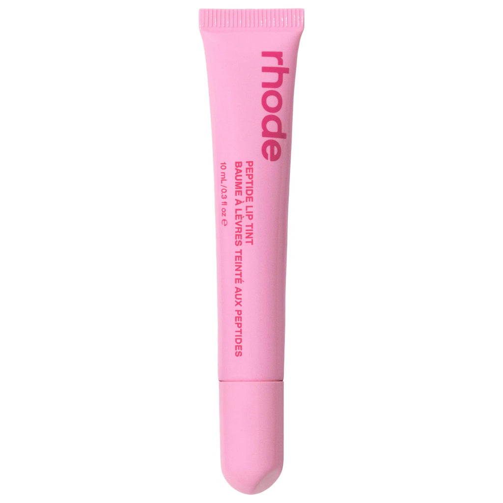 Tratamiento labial con color Rhode Peptide Lip Tint en tubo rosa